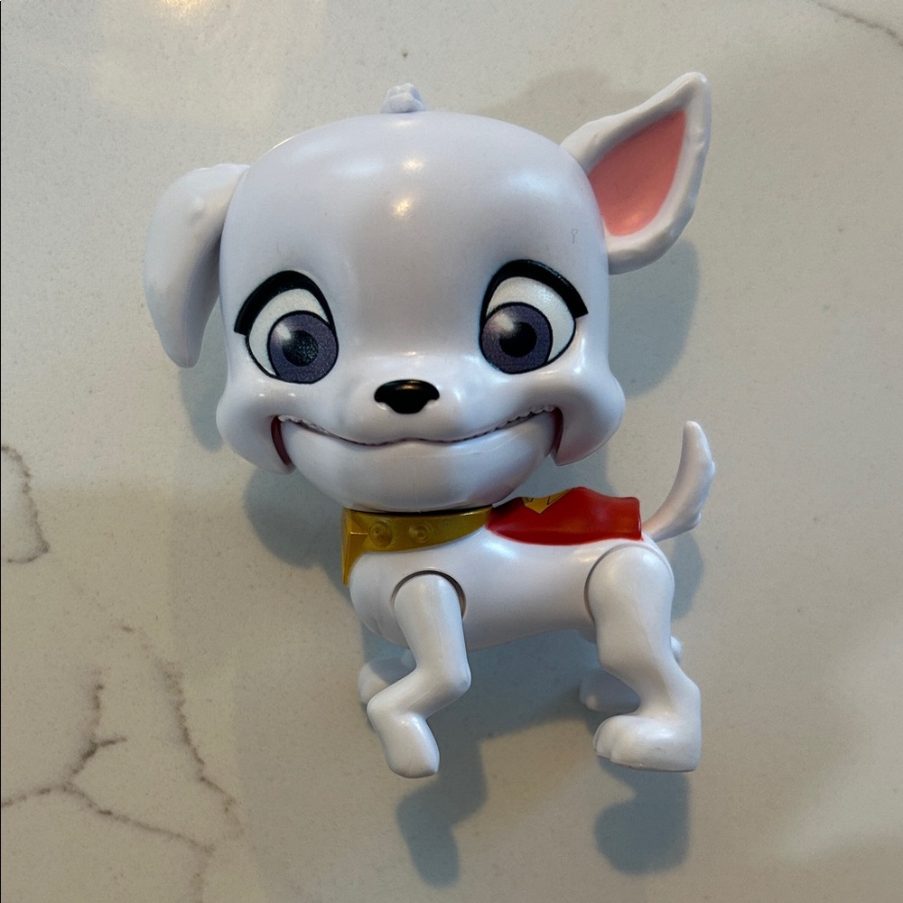 White Cartoon Dog Figurine with Red Cape